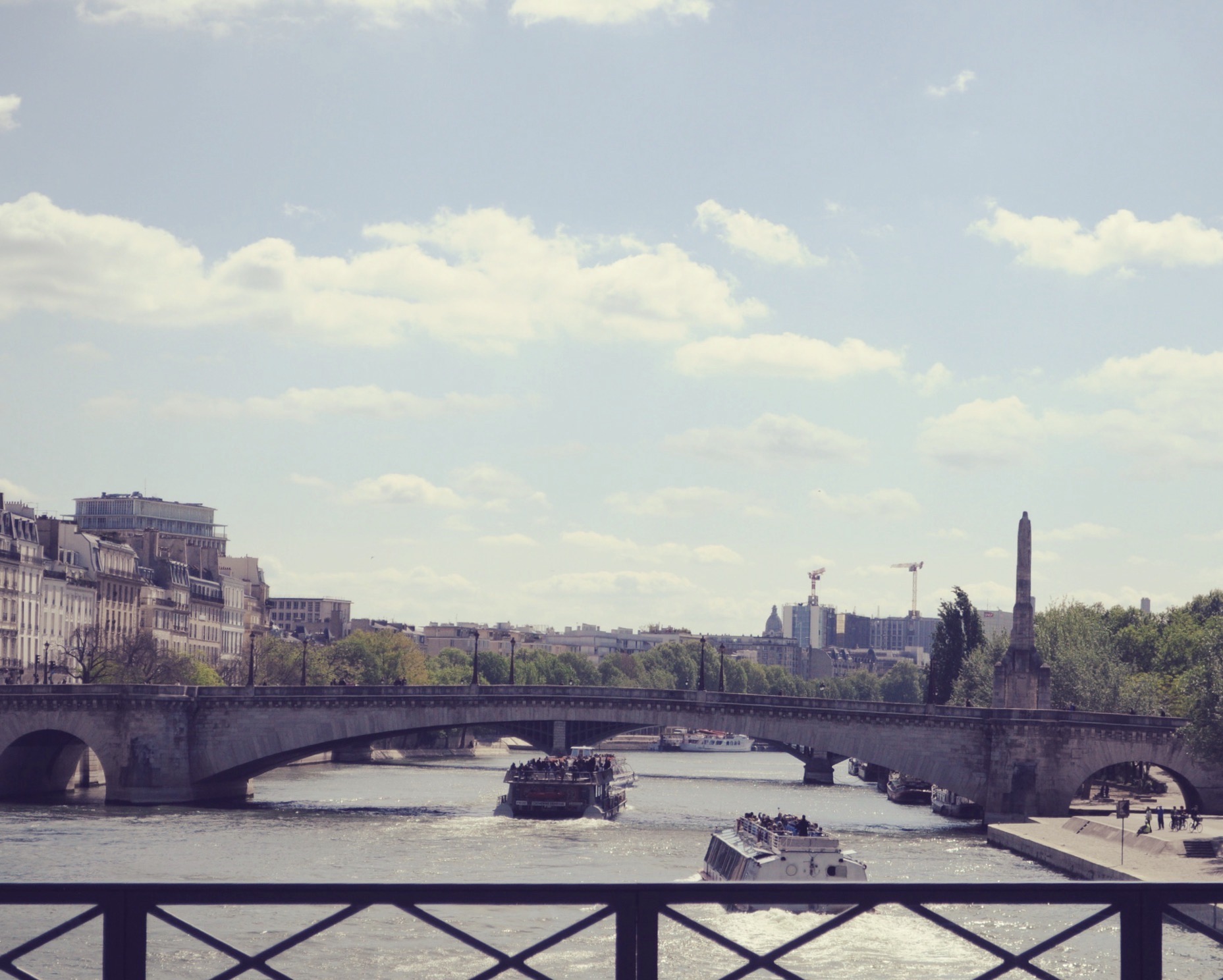 river-seine-Paris-overlooking-bridge-Celine-Concierge